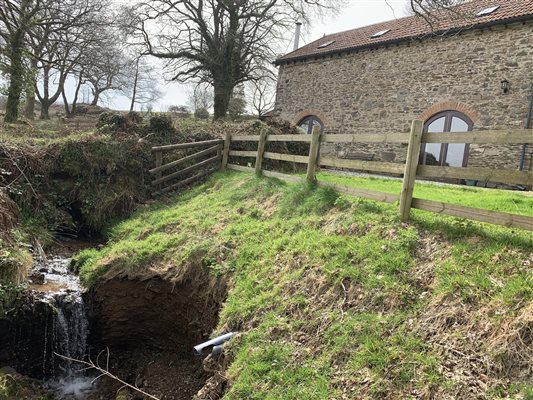 stream and waterfall to the front